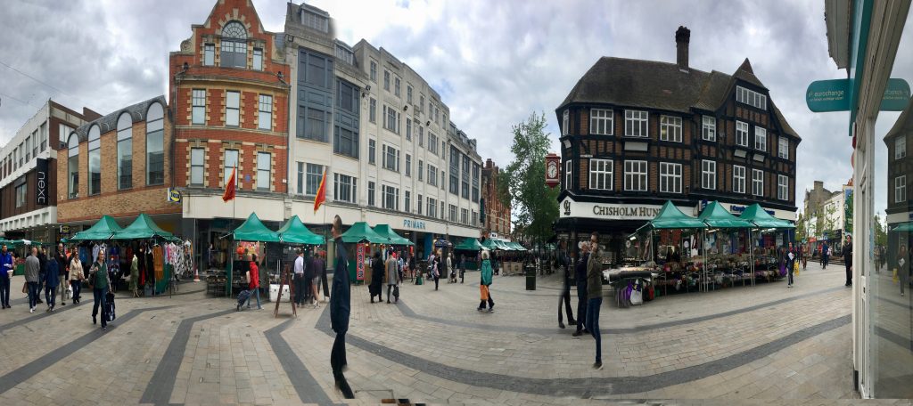 green topped market stalls in market square
