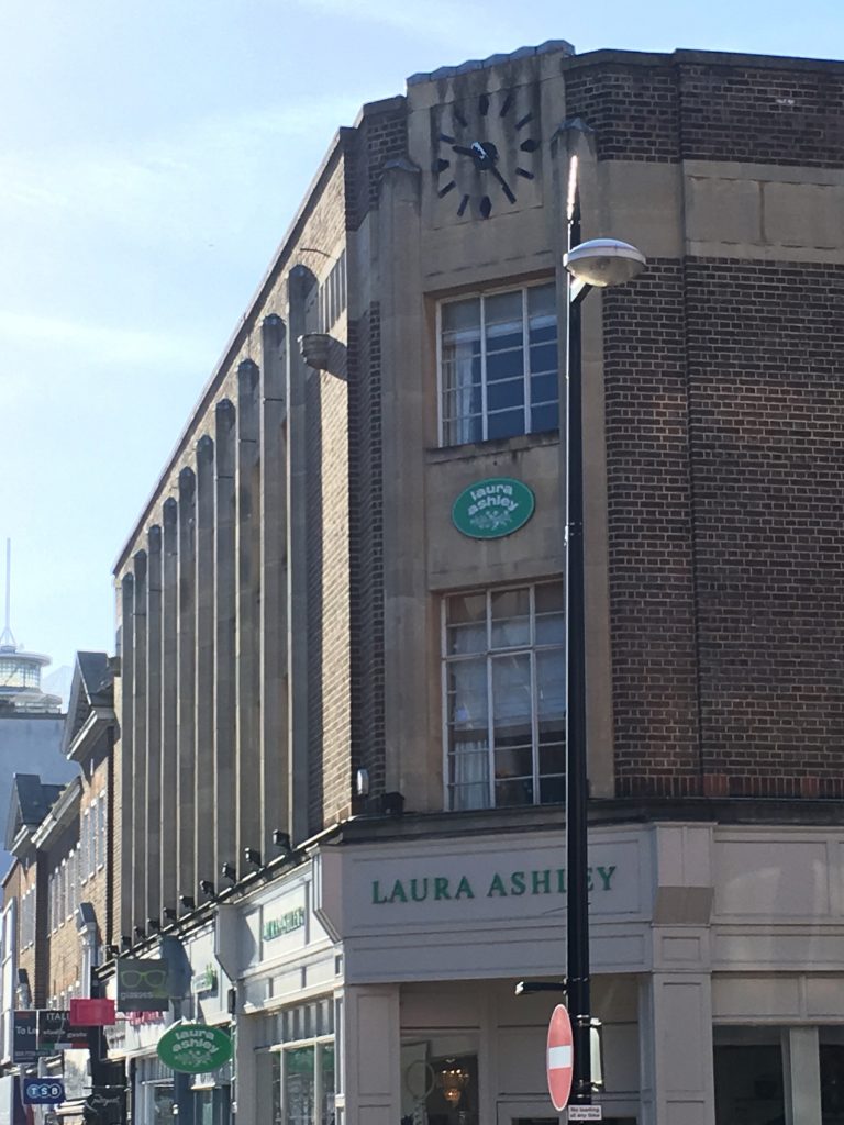 Fine art deco clock face on the corner