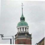 stylish copper green cupula on hexagonal tower