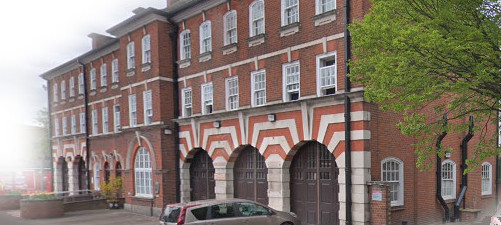 three storey fire station with striking brick and stone stripes