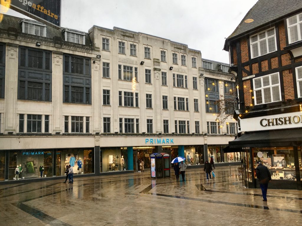 wet pavement and art deco department store