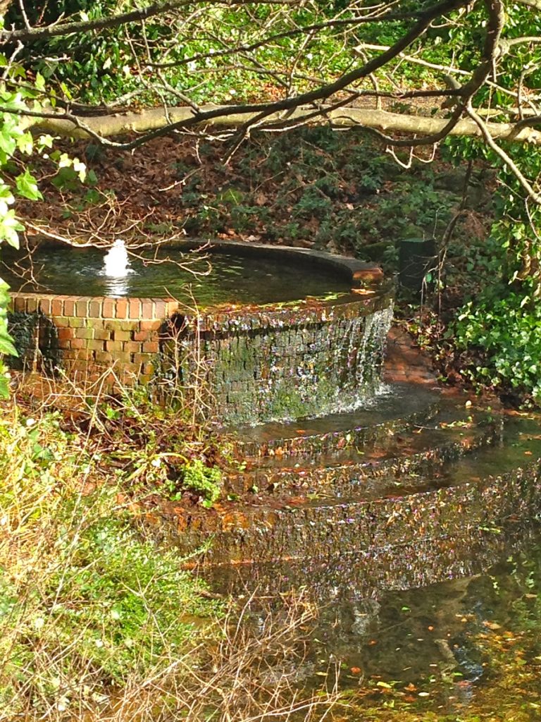 little fountain in circular walls